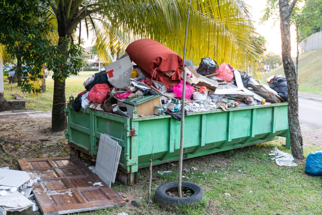 Removal,Rubbish,Dumpster,Bin,With,Load,Of,Material,For,Disposal