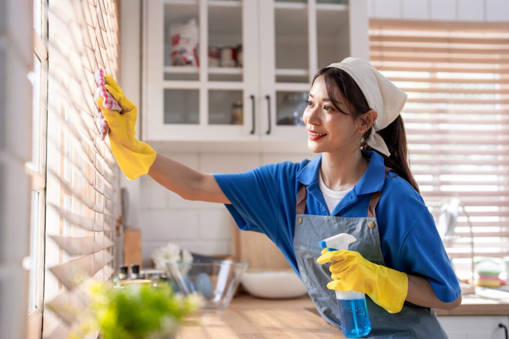 Asian,Young,Beautiful,Female,Cleaner,Worker,Cleaning,Kitchen,At,Home.